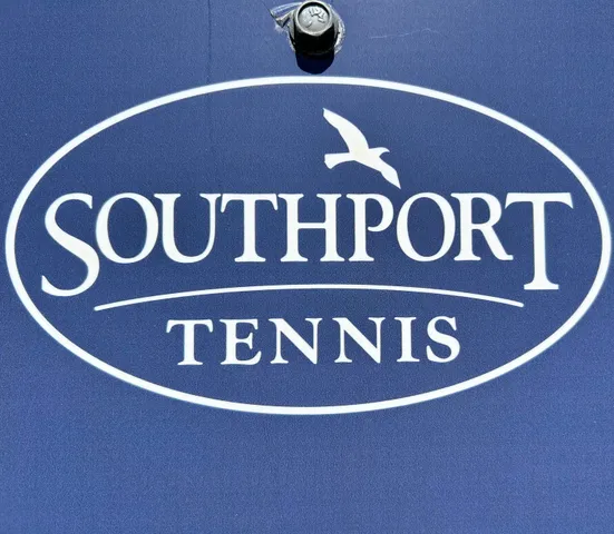 a front view of a house with a garage