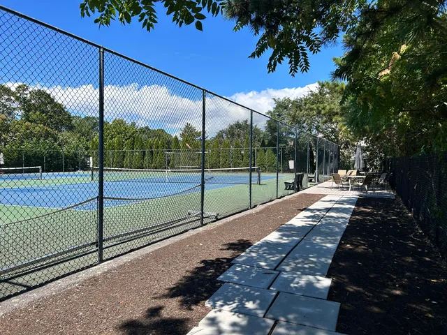 a view of front door and flowers