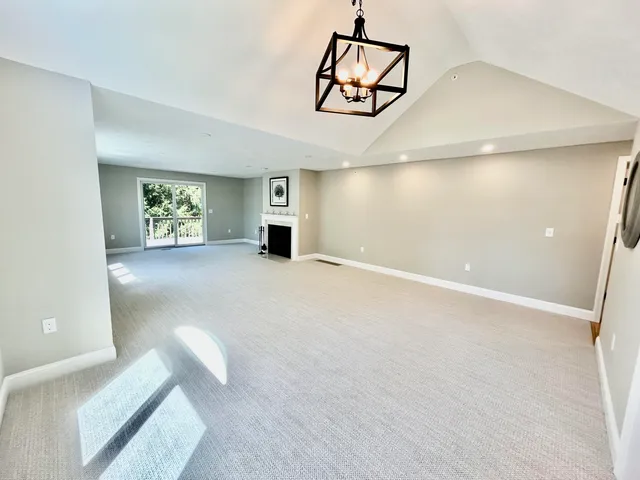 a living room with a fireplace