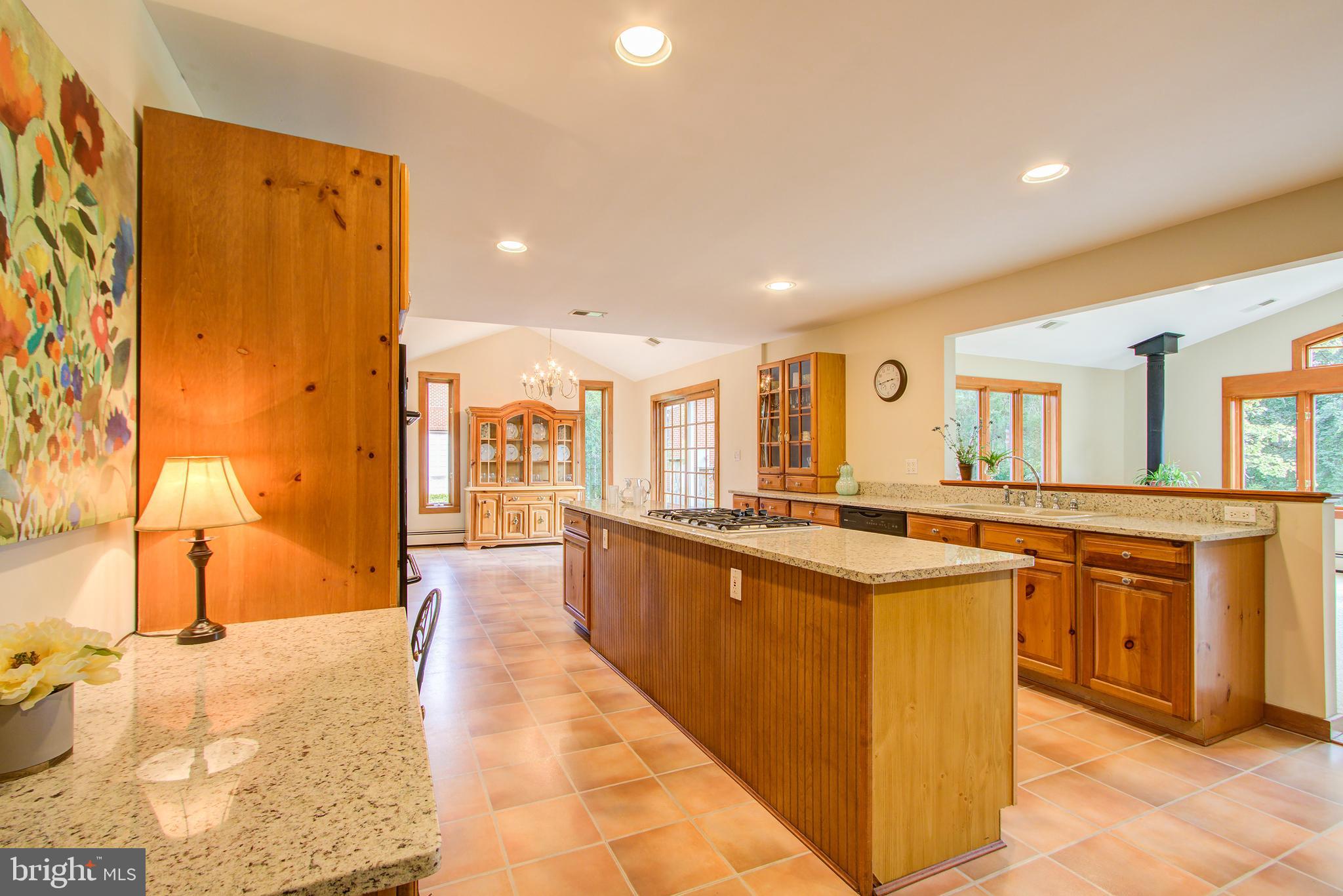 Gorgeous Kitchen with Granite & Hardwood Cabinets
