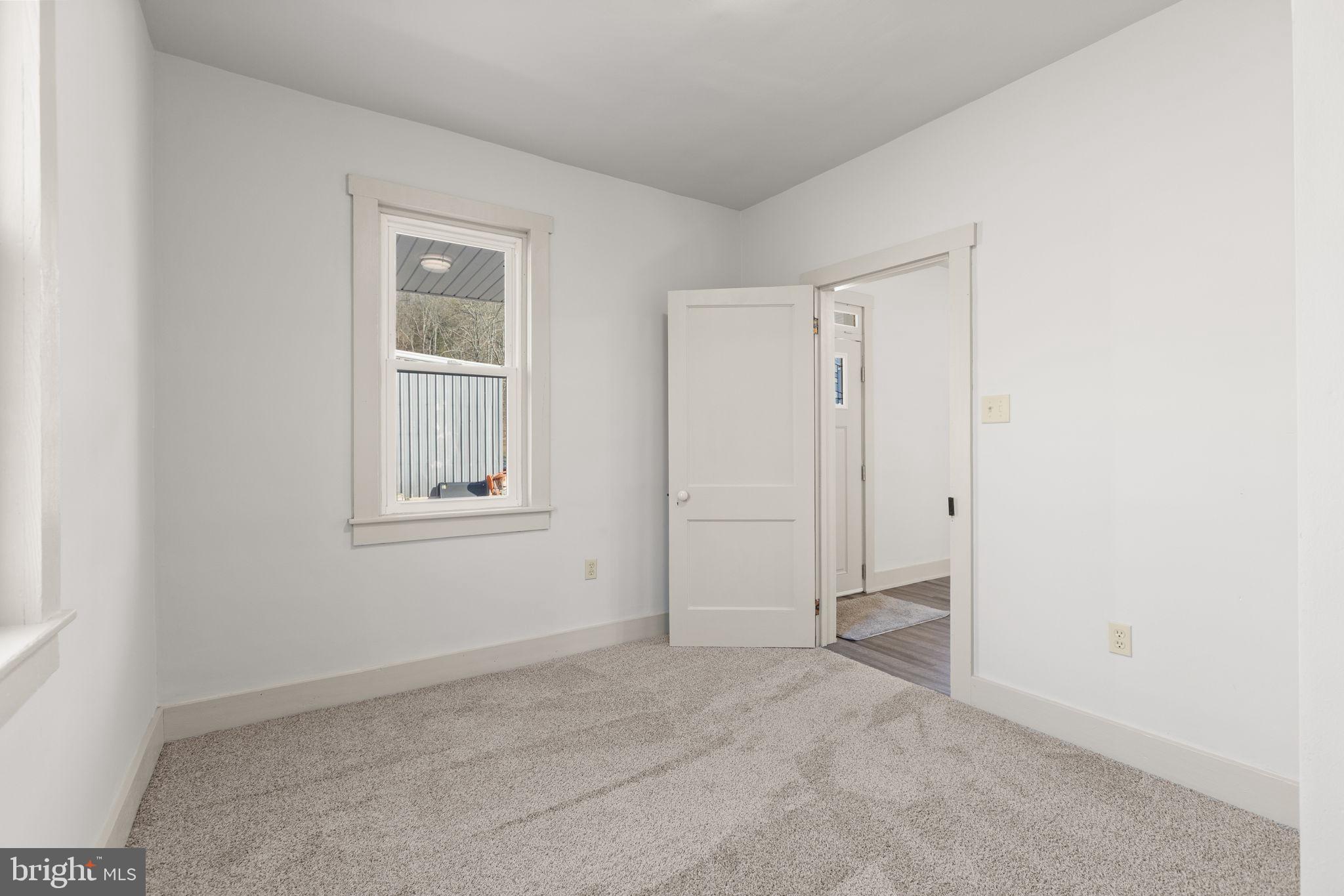1586 Schwaben Creek Road Dornsife, PA 17823 - Photo 16 of 39 an empty room with windows
