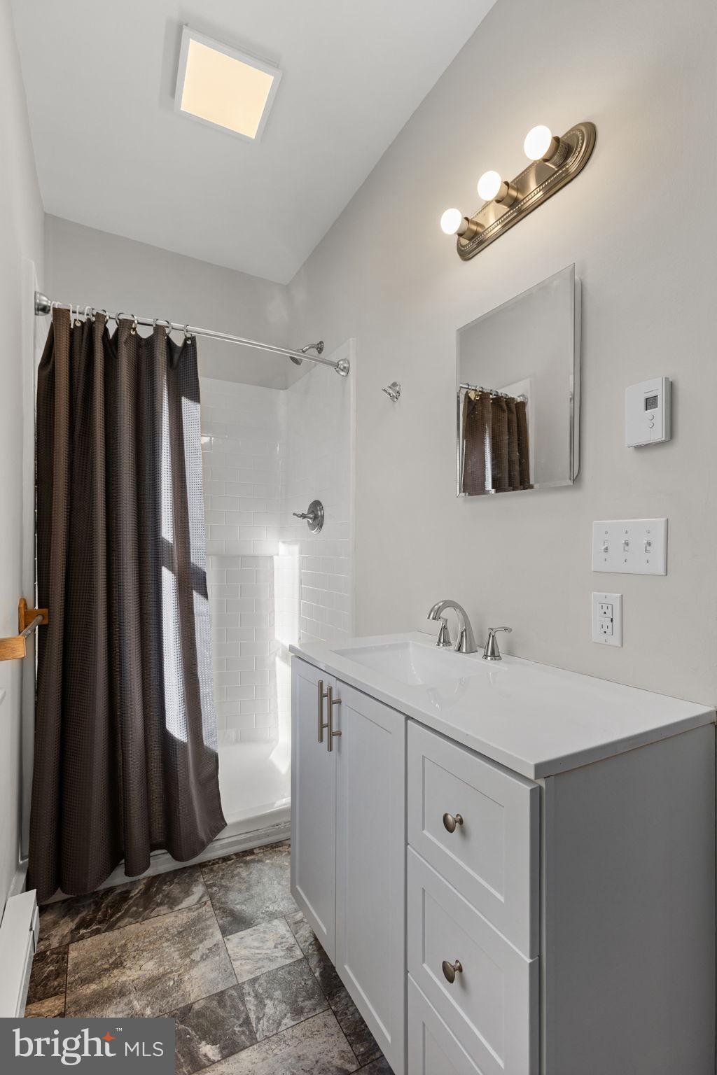 1586 Schwaben Creek Road Dornsife, PA 17823 - Photo 19 of 39 a bathroom with a sink and a mirror