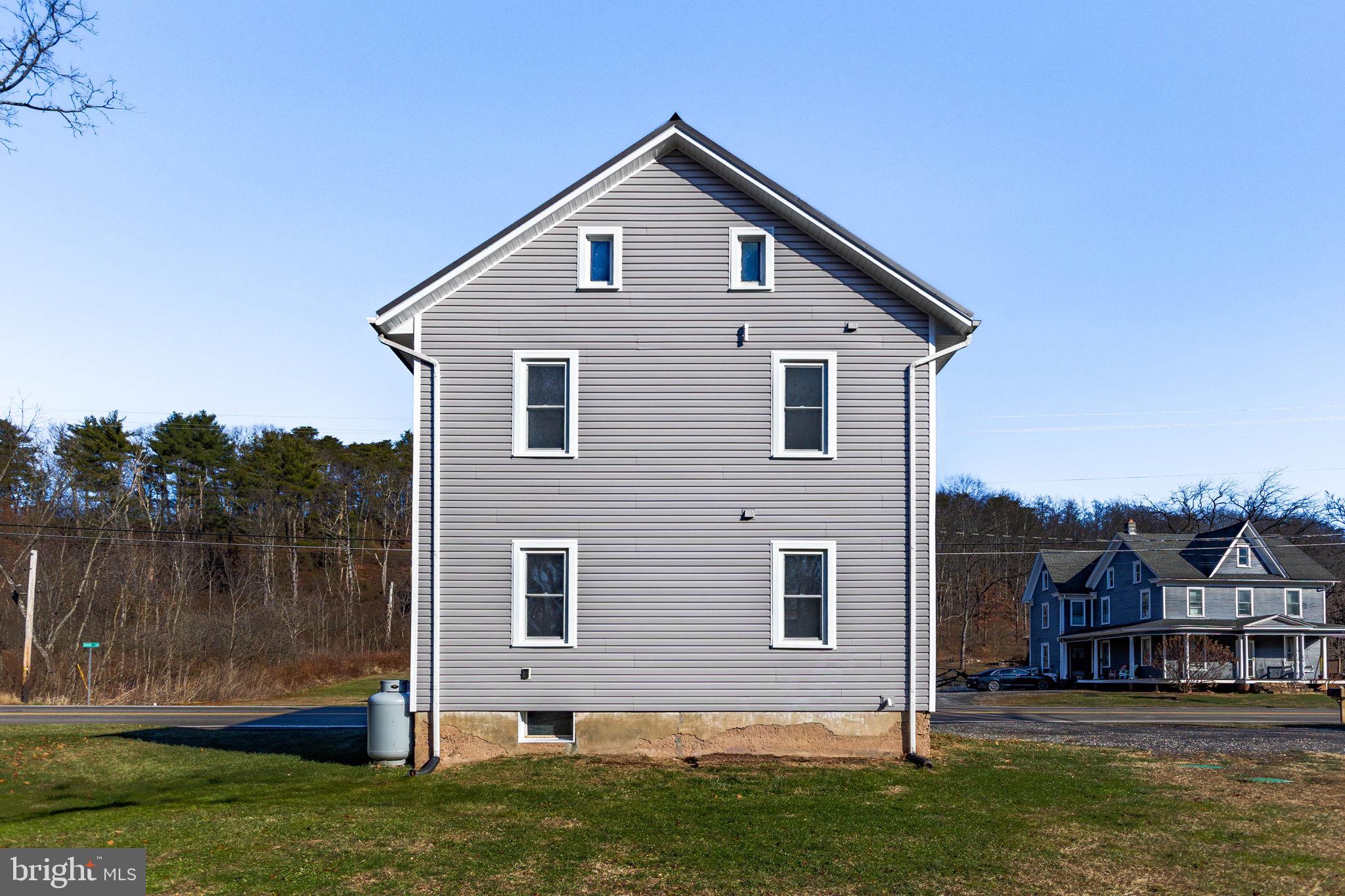 1586 Schwaben Creek Road Dornsife, PA 17823 - Photo 36 of 39 a view of a house with a yard
