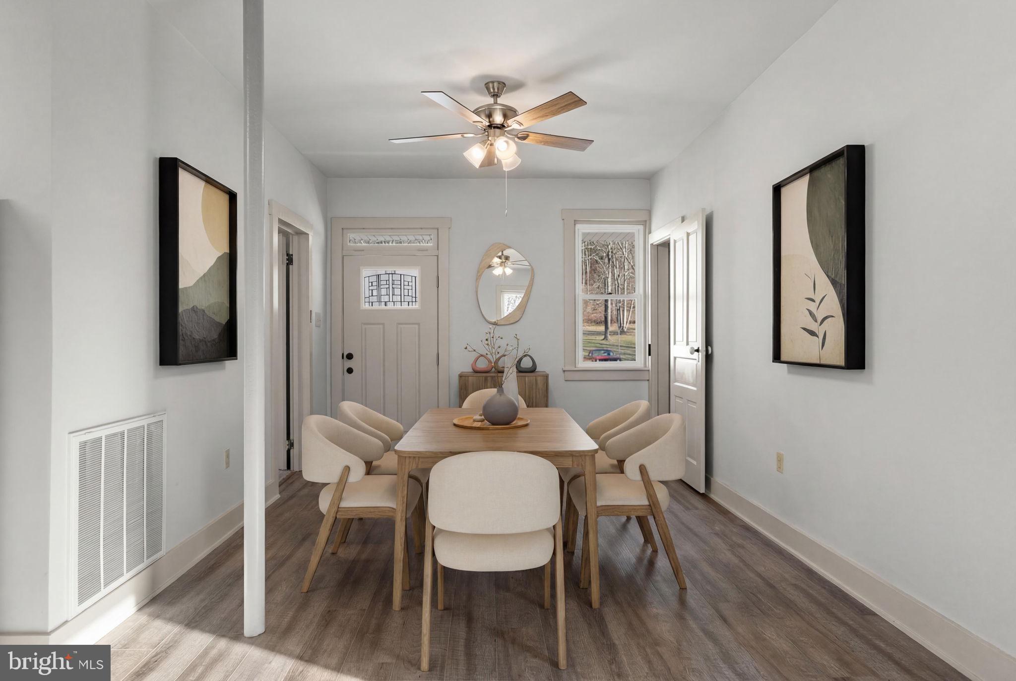 1586 Schwaben Creek Road Dornsife, PA 17823 - Photo 5 of 39 a view of a dining room with furniture and wooden floor