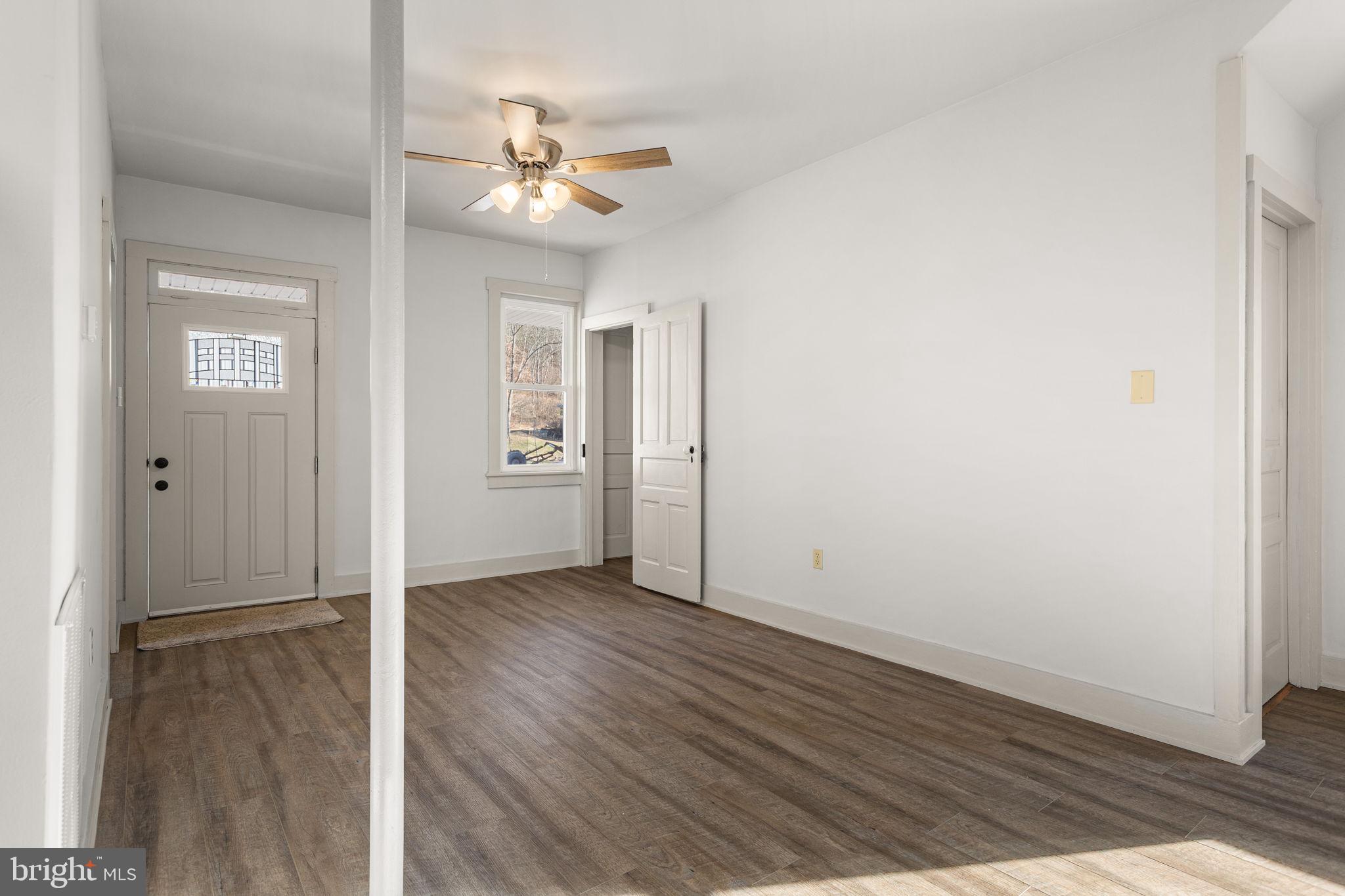 1586 Schwaben Creek Road Dornsife, PA 17823 - Photo 10 of 39 a view of an empty room with wooden floor
