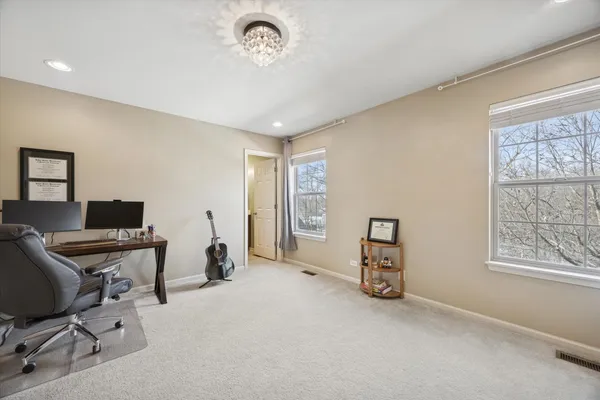 a view of workspace with hardwood wall