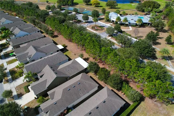 a view of a lake with houses in outdoor space