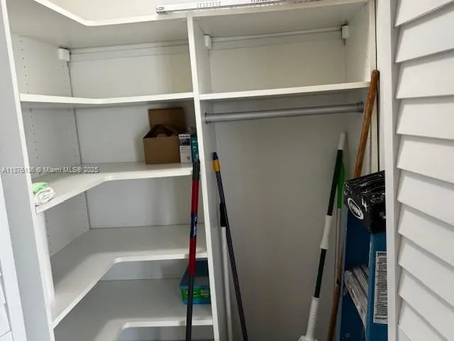 a view of a swimming pool and a yard