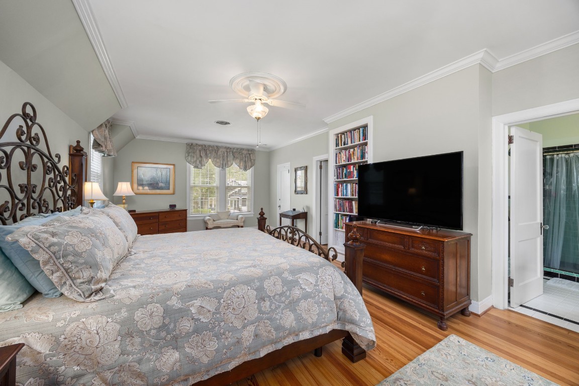 801 West Main Street Brenham, TX 77833 - Photo 26 of 50 You also have plenty of space for a large king size bedroom set and more. Crown molding, a ceiling fan, and a built in bookcase add to this spacious retreat.
