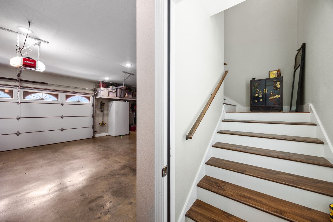 801 West Main Street Brenham, TX 77833 - Photo 35 of 50 The oversized garage offers ample room for parking and storage, while a private staircase leads to approximately 700 square feet of custom built living space above the garage.
