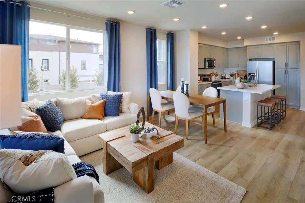 9520 Hannah Way Riverside, CA 92505 - Photo 13 of 22 a living room with furniture kitchen and a large window
