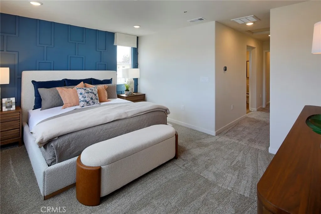 9520 Hannah Way Riverside, CA 92505 - Photo 17 of 22 a bed room with a bed and a night stand