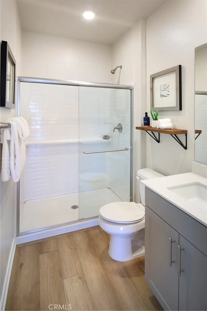 9520 Hannah Way Riverside, CA 92505 - Photo 19 of 22 a bathroom with a toilet sink and shower