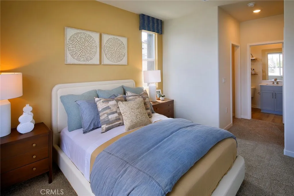 9520 Hannah Way Riverside, CA 92505 - Photo 21 of 22 a bedroom with a bed and cabinets