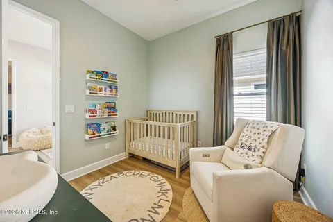 a view of a swimming pool with chairs