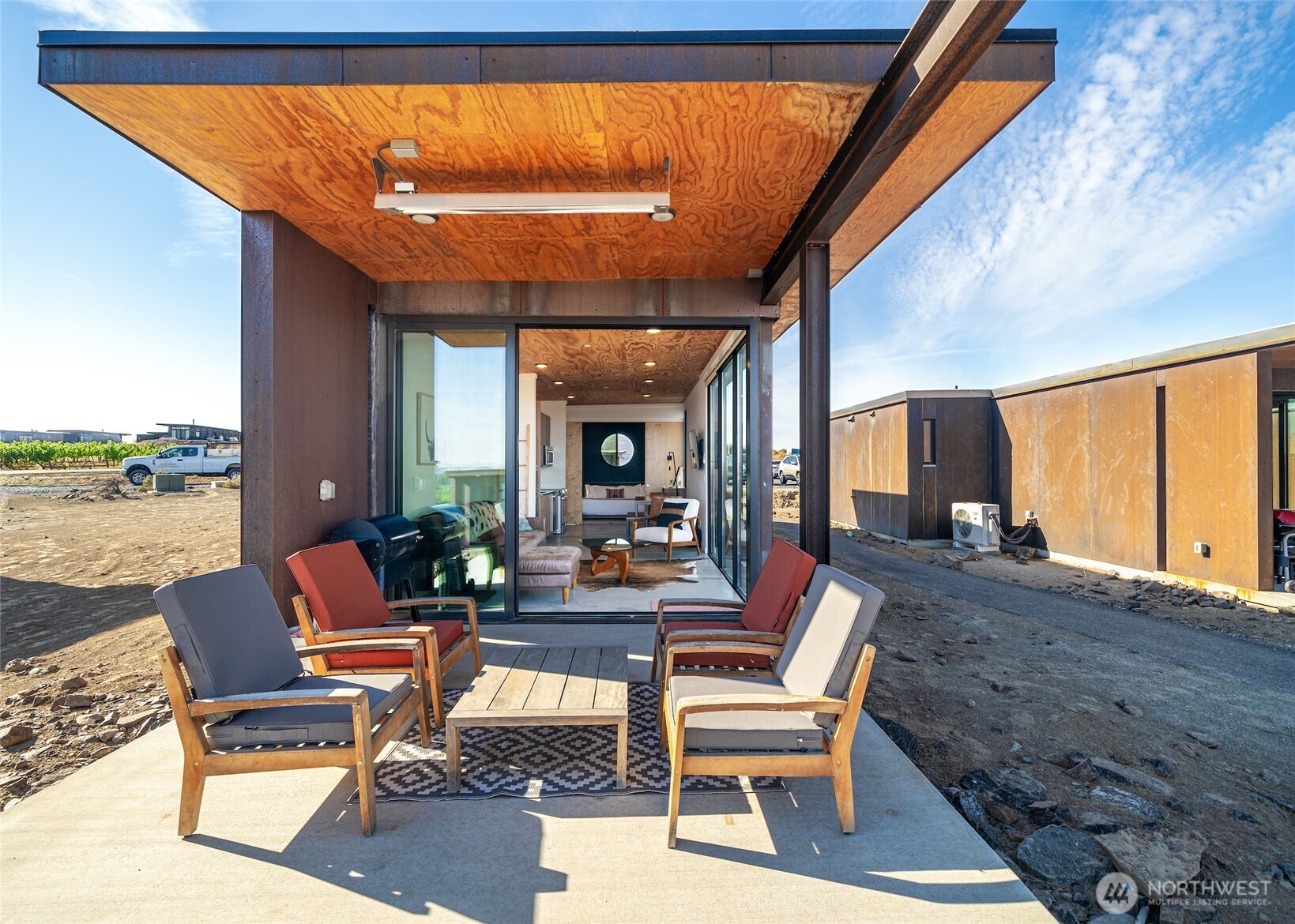 a outdoor living space with furniture and garden view