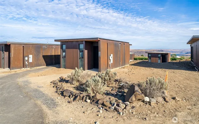 a kitchen with counter top space a sink and cabinets