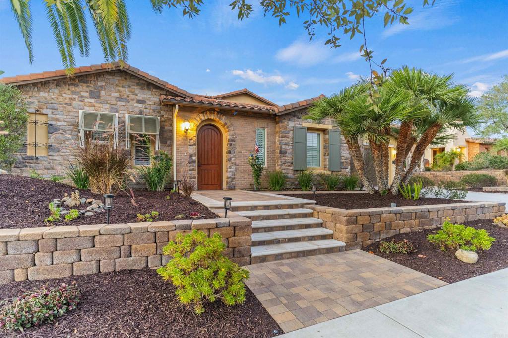 3208 Corte Pacifica Carlsbad, CA 92009 - Photo 1 of 1 a front view of a house with a yard