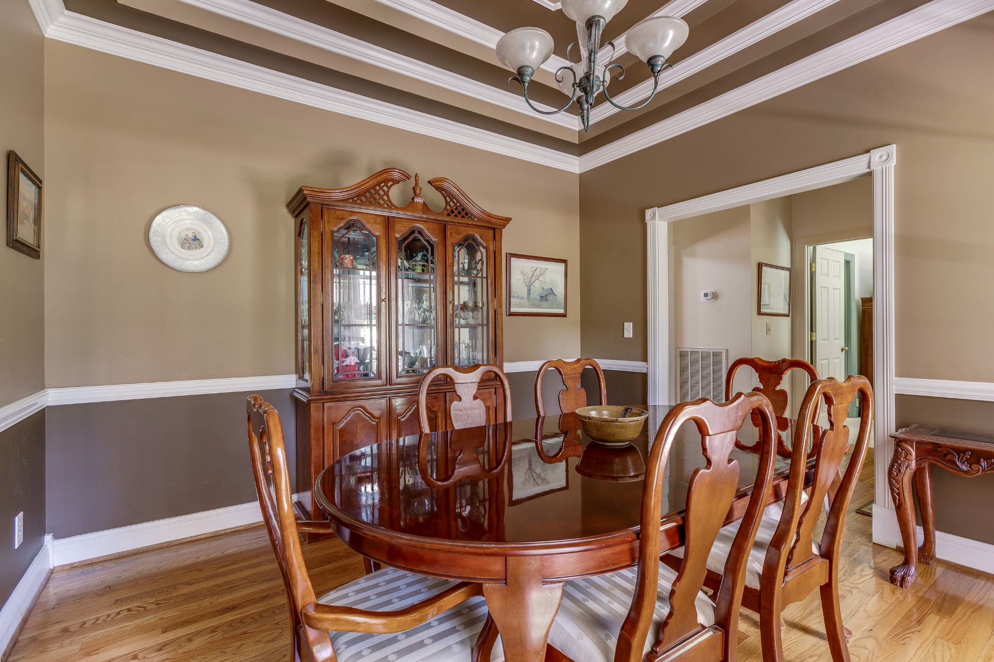 1111 Temple Ridge Court Nashville, TN 37221 - Photo 13 of 46 a view of a dining room with furniture and chandelier