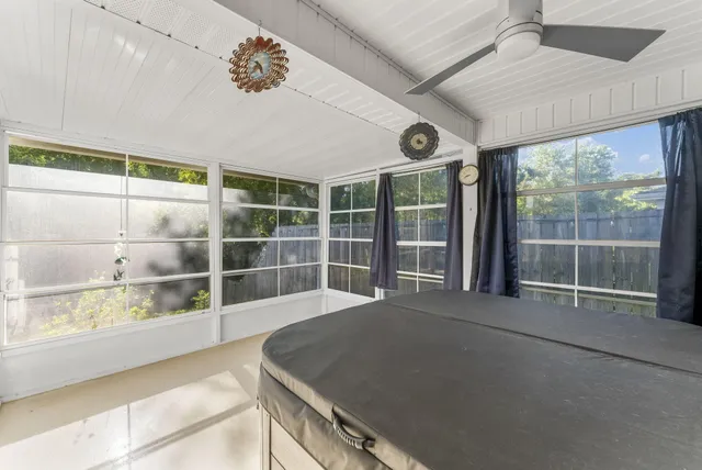 a view of an empty room with a balcony