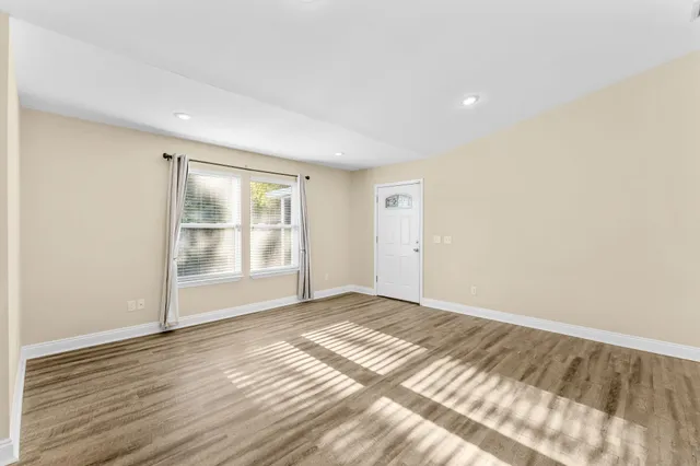 a view of an empty room and window