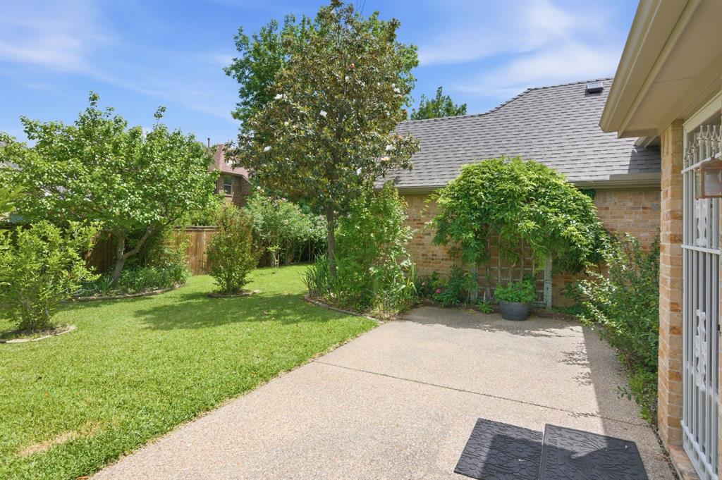 8180 Holliday Road Lantana, TX 76226 - Photo 29 of 31 You'll be amazed at the beauty of the backyard. Plenty of patio space for table, chairs and a grill.