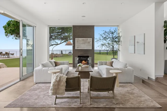 a bathroom with a double vanity sink toilet and shower