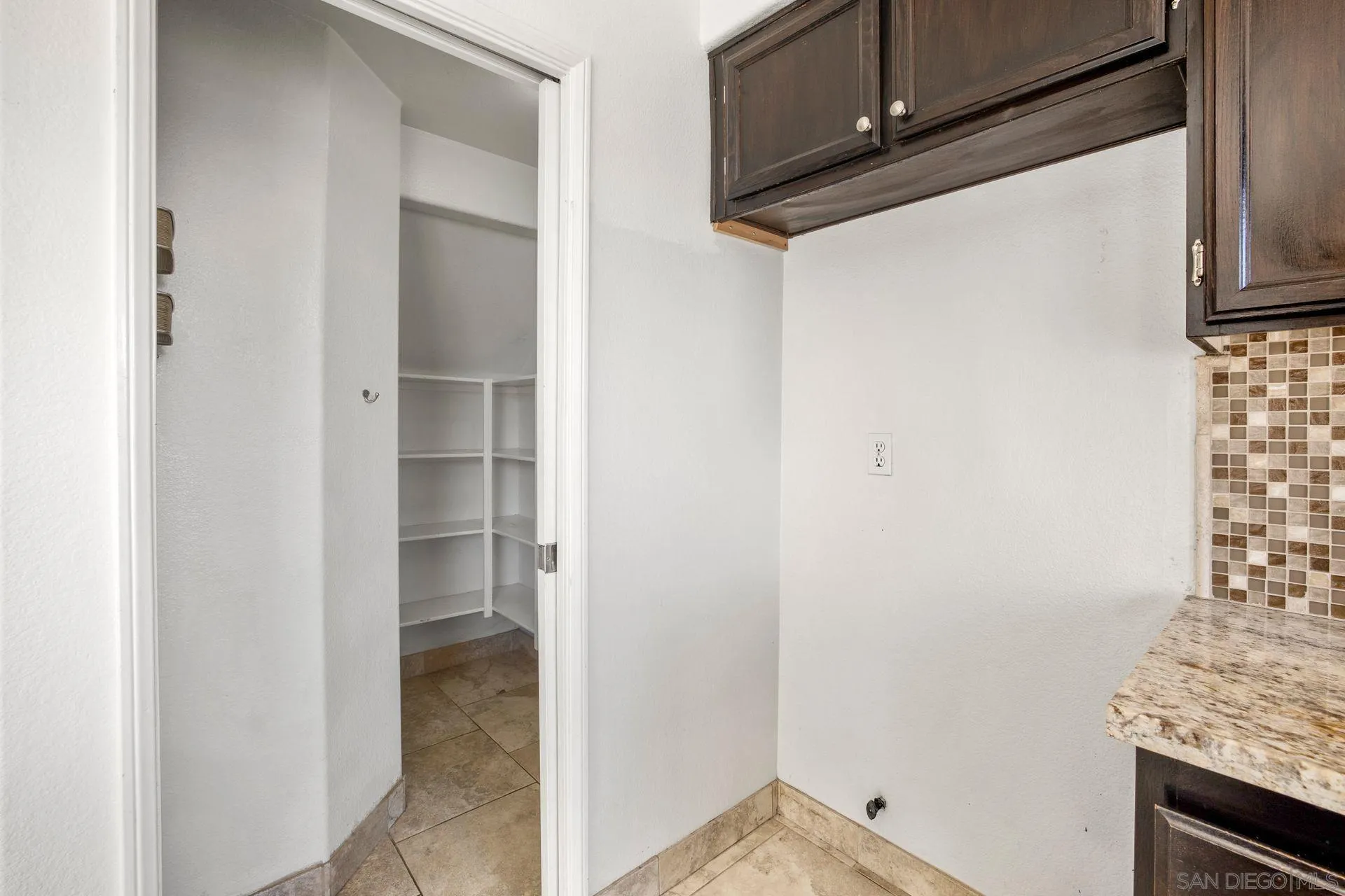 418 Carmel Creeper Place Encinitas, CA 92024 - Photo 24 of 31 a view of storage and utility room with washer and dryer