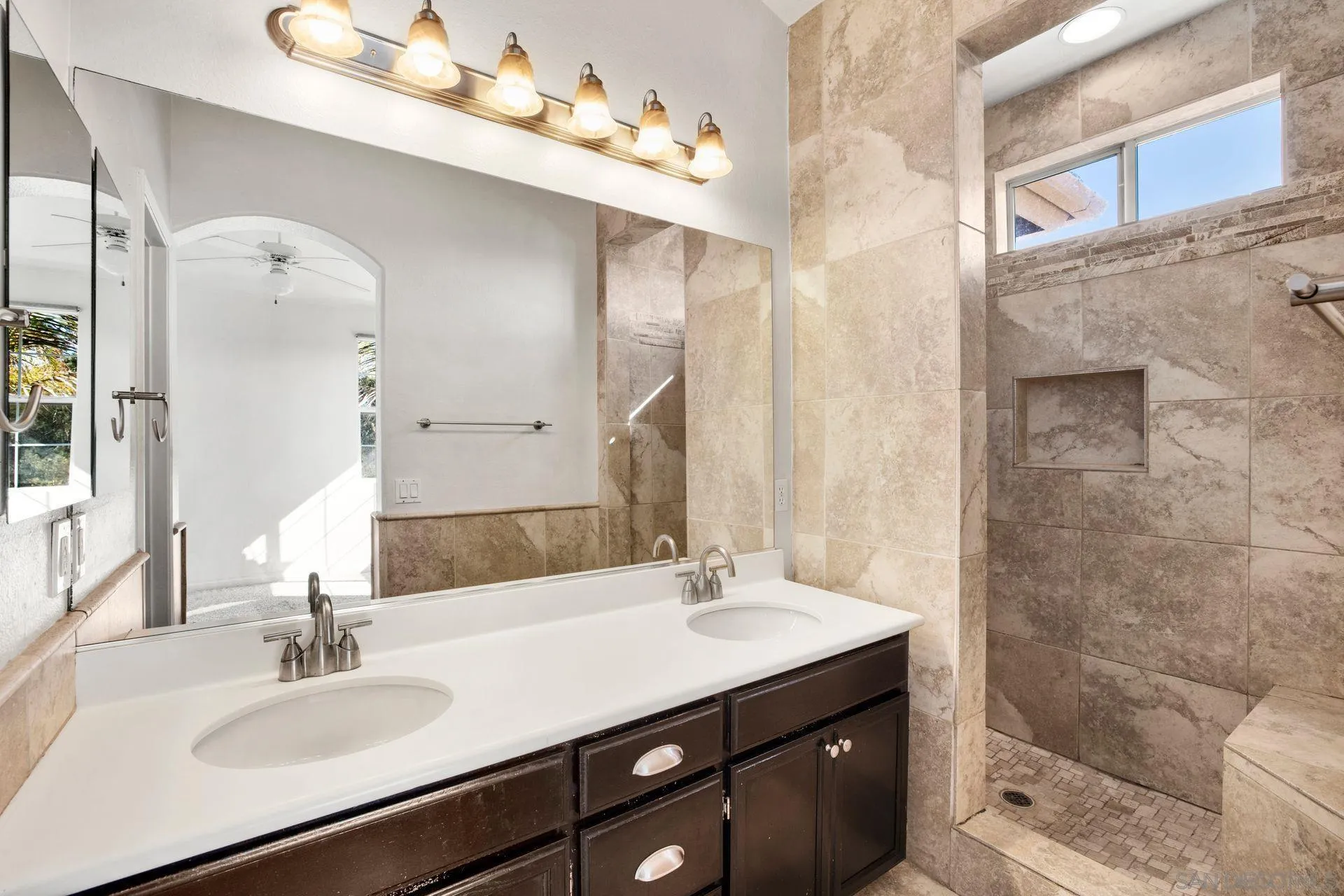 418 Carmel Creeper Place Encinitas, CA 92024 - Photo 27 of 31 a bathroom with a sink double vanity and shower