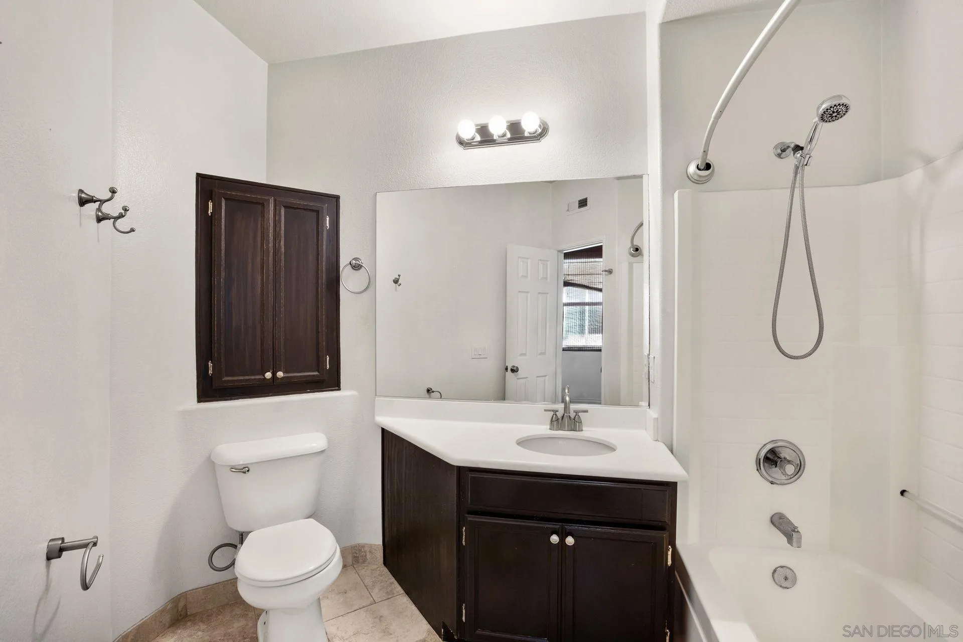 418 Carmel Creeper Place Encinitas, CA 92024 - Photo 29 of 31 a bathroom with a sink a toilet and shower