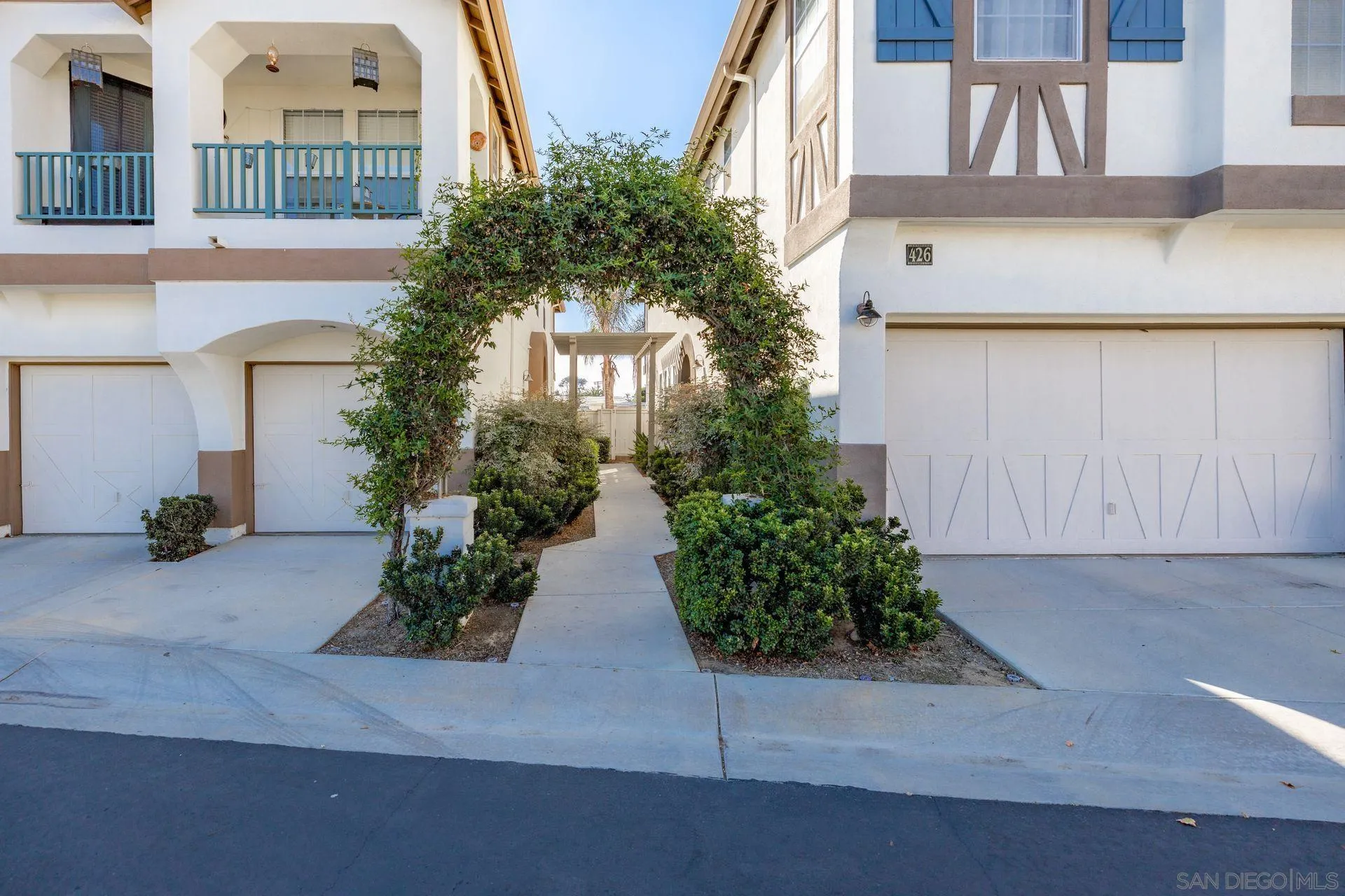418 Carmel Creeper Place Encinitas, CA 92024 - Photo 3 of 31 a front view of a house