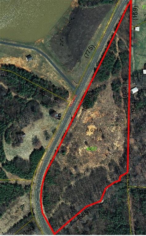 1530 Old Mill Road Pinnacle, NC 27043 - Photo 3 of 10 Well on property, significant road frontage and 2 acres previously cleared (brush has since grown in the cleared section).