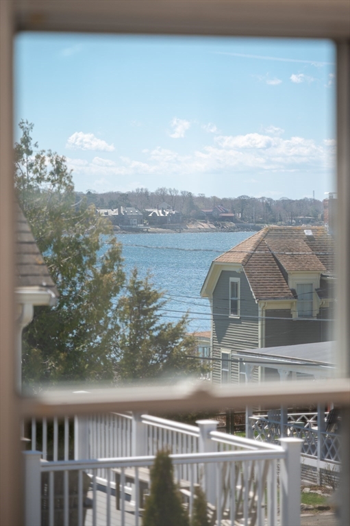 10 Fremont Street Gloucester, MA 01930 - Photo 15 of 37 a view of a lake from a balcony