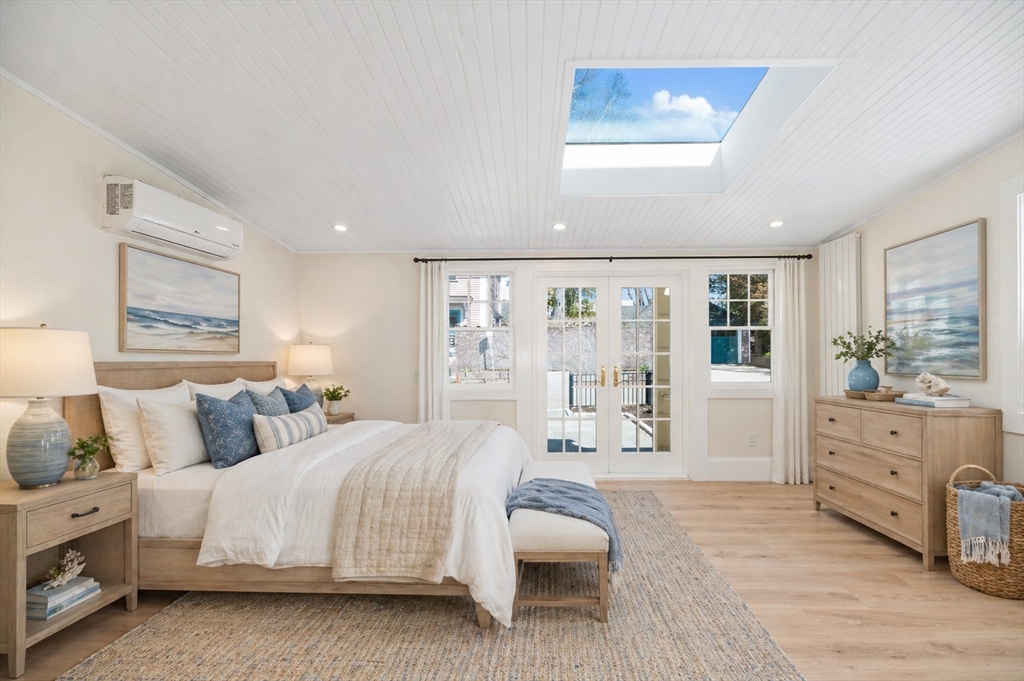 10 Fremont Street Gloucester, MA 01930 - Photo 21 of 37 a bedroom with a large bed and a window