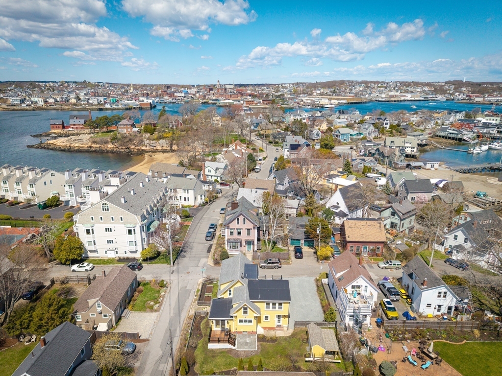 10 Fremont Street Gloucester, MA 01930 - Photo 31 of 37 an aerial view of residential building with parking space