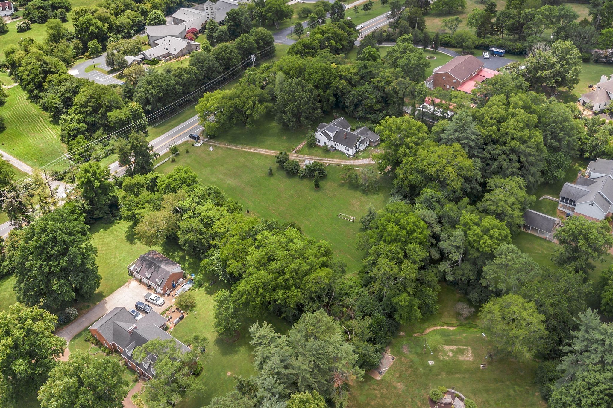 517 Franklin Road Franklin, TN 37069 - Photo 8 of 22 an aerial view of residential house with outdoor space and trees all around