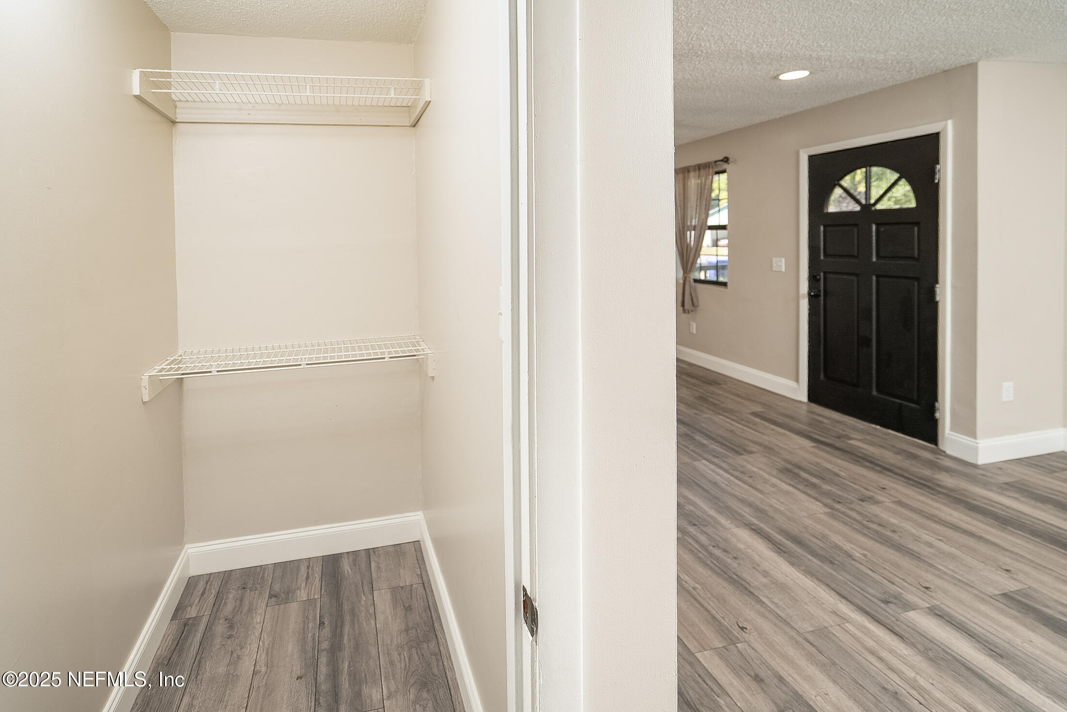 1131 Butler Avenue St. Augustine, FL 32084 - Photo 15 of 15 a view of hallway with wooden floor