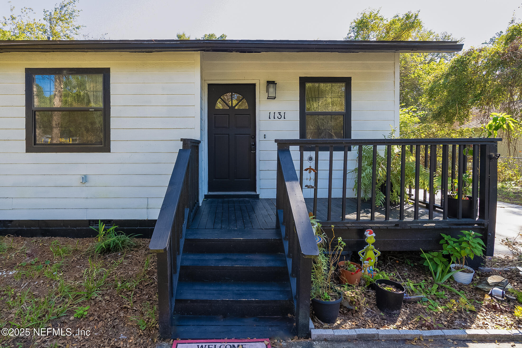 1131 Butler Avenue St. Augustine, FL 32084 - Photo 2 of 15 a view of a door front of house
