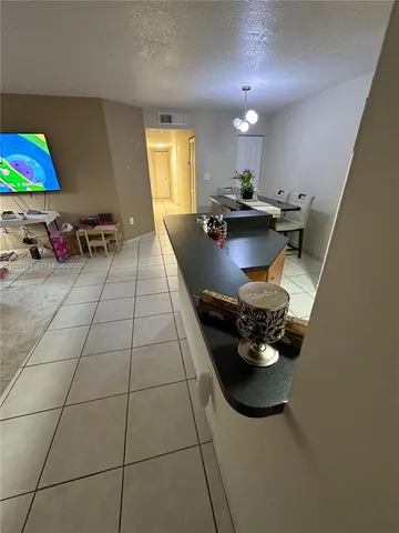 a gym hall with exercise machine