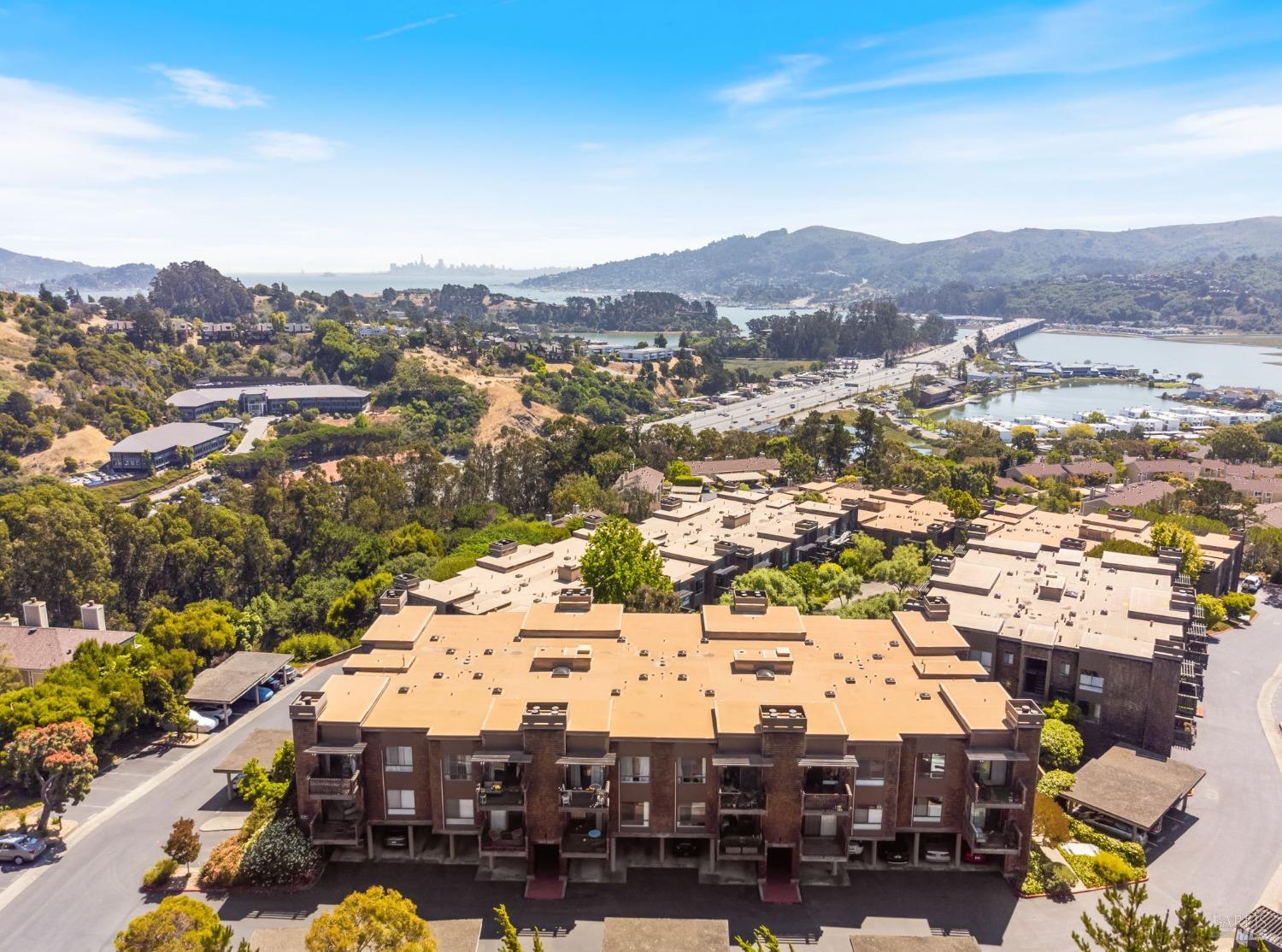 an aerial view of residential building and parking space