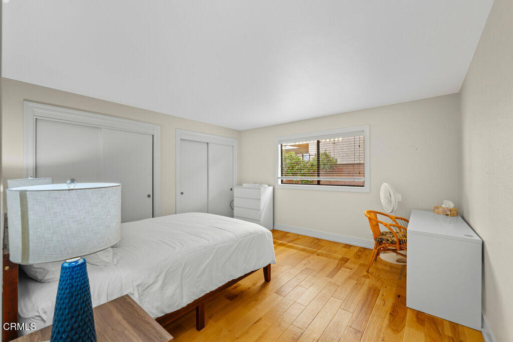 5003 Island View Street Oxnard, CA 93035 - Photo 20 of 30 a bedroom with a bed and a couch