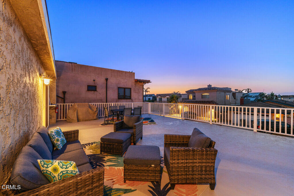 5003 Island View Street Oxnard, CA 93035 - Photo 26 of 30 a outdoor living space with patio furniture and city view