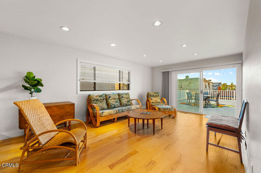 5003 Island View Street Oxnard, CA 93035 - Photo 29 of 30 a living room with patio furniture and a large window