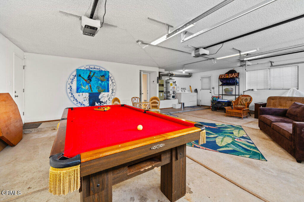 5003 Island View Street Oxnard, CA 93035 - Photo 30 of 30 a room with pool table flat screen tv and a table