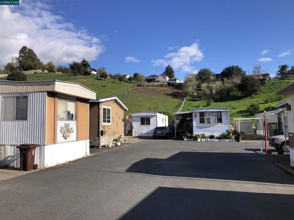 4556 Appian Way El Sobrante, CA 94803 - Photo 15 of 16 a view of house with outdoor space and parking