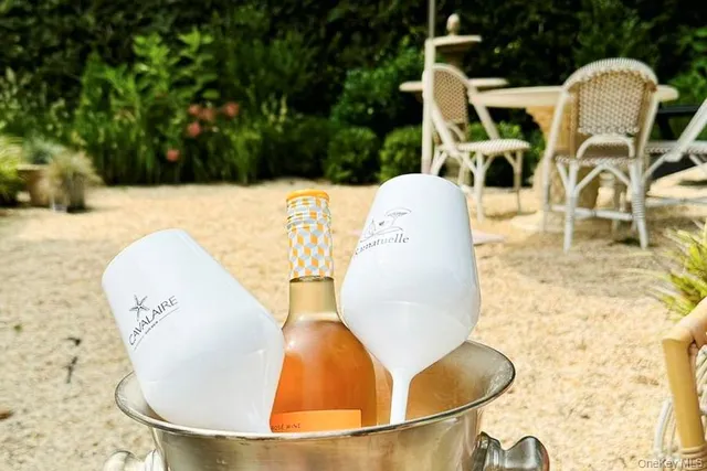 a view of a bench in the backyard