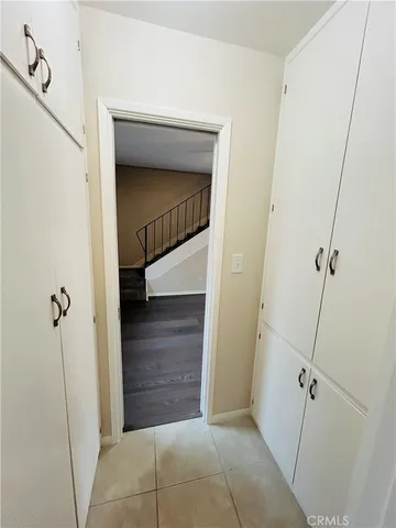 a view of a hallway with closet