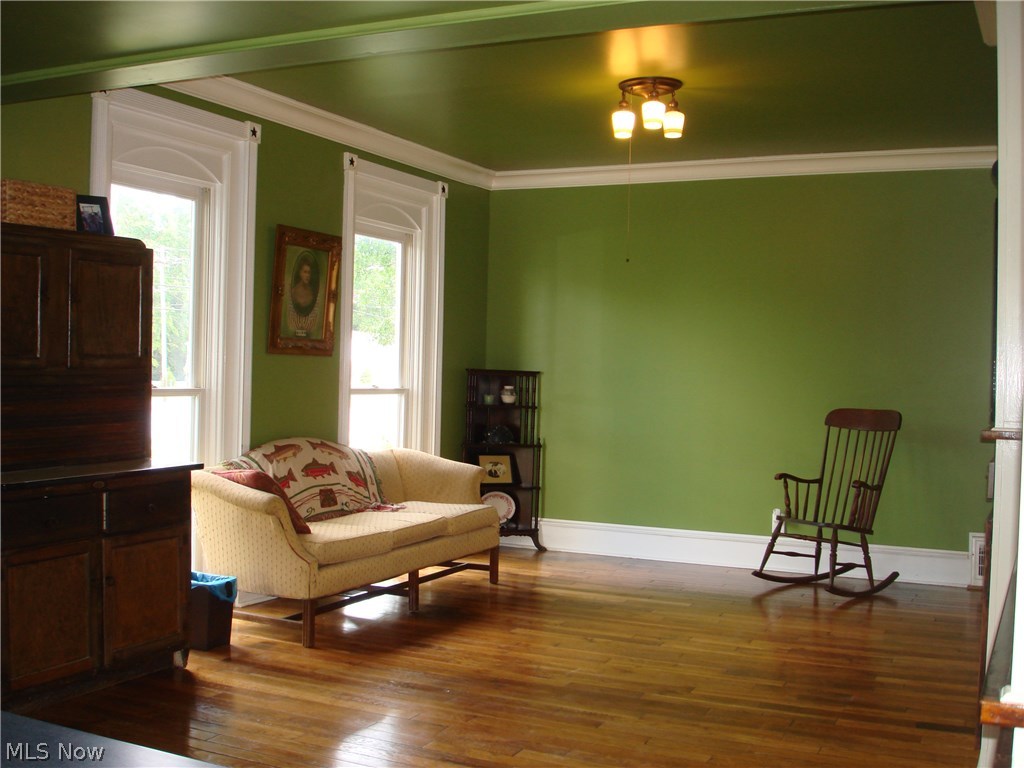 919 Richmond Road Cleveland, OH 44124 - Photo 13 of 35 Beautiful family room has floor to ceiling front windows with decorative framing that you won't find anywhere else! Vintage light fixtures too.