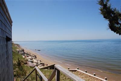 225 Sparrow Road Eastham, MA 02642 - Photo 3 of 11 a view of an ocean from a balcony