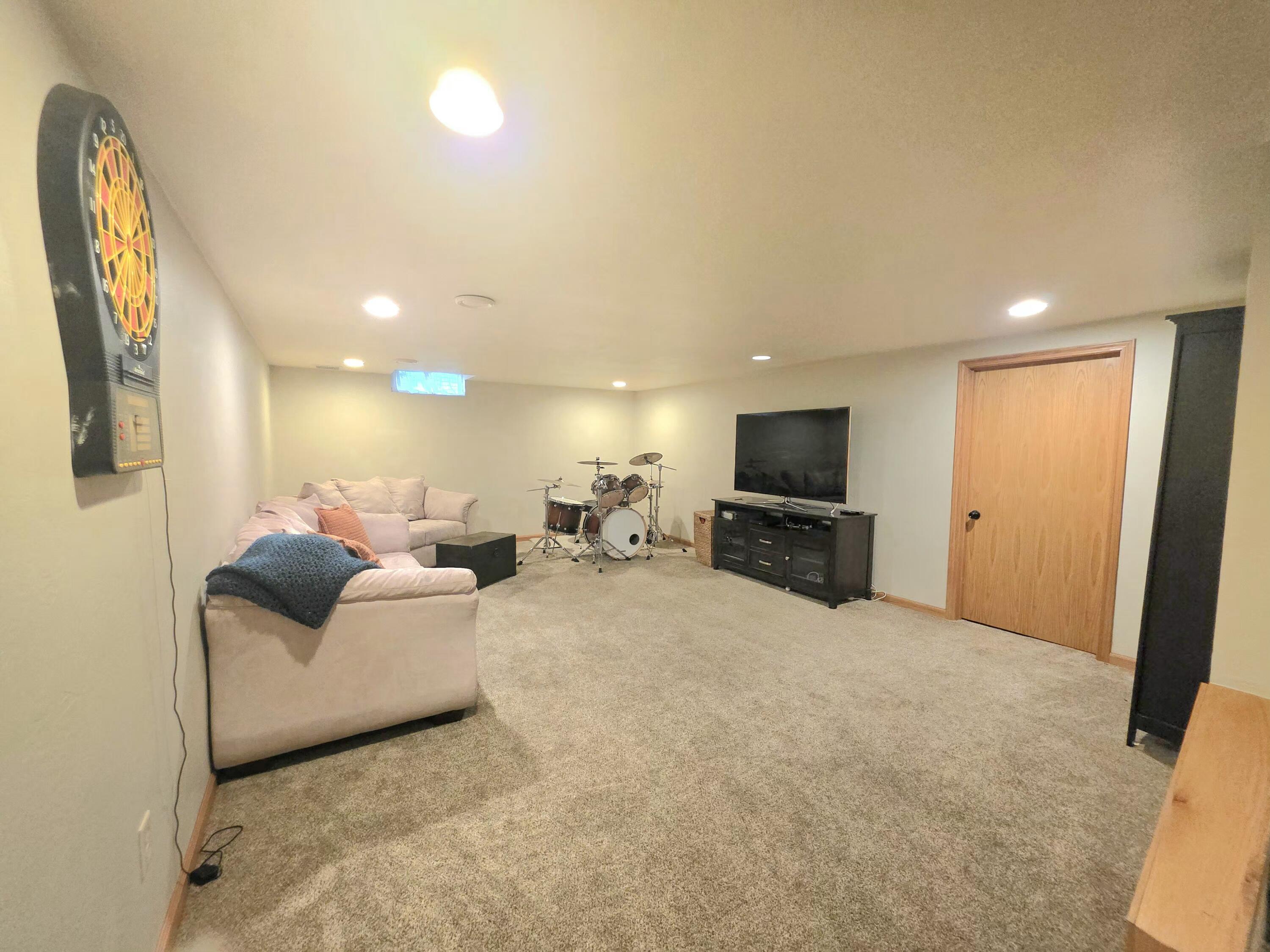 566 Riford Road Neenah, WI 54956 - Photo 43 of 63 Lower level Rec room